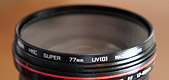 photo of a 77 mm UV filter on a lens